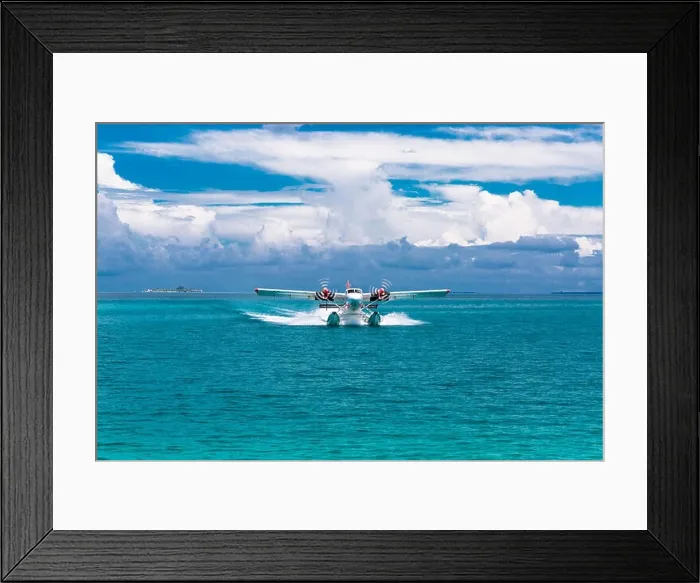 Framed Print : Twin otter red and white seaplane landing at Maldives Framed Print : Twin otter red and white seaplane landing at Maldives