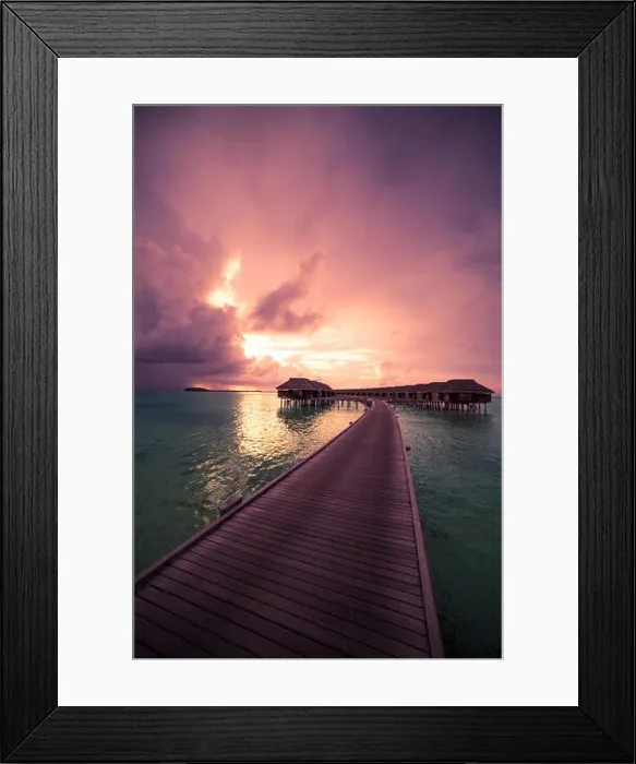Framed Print : Amazing abstract background. Beautiful sunset colors in Maldives. Long jetty and luxury overwater villas Framed Print : Amazing abstract background. Beautiful sunset colors in Maldives. Long jetty and luxury overwater villas