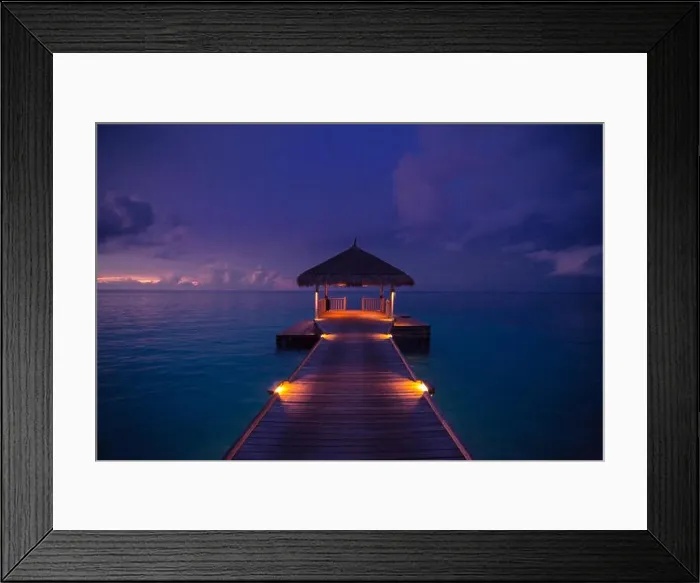 Framed Print : Amazing abstract background. Beautiful sunset colors in Maldives. Long jetty and luxury overwater villas Framed Print : Amazing abstract background. Beautiful sunset colors in Maldives. Long jetty and luxury overwater villas