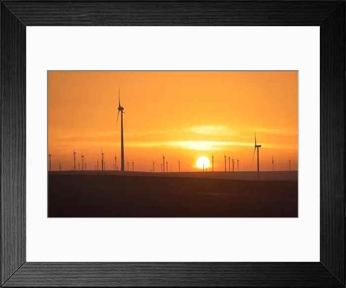 Framed Print : Eolian turbines park at sunet, warm light. Wind power concept Framed Print : Eolian turbines park at sunet, warm light. Wind power concept