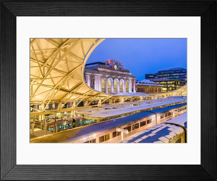 Framed Print : DENVER, COLORADO - MARCH 13, 2019: Trains out of service at Union Station after the Bomb Cyclone winter weather event. The central portion of the st Framed Print : DENVER, COLORADO - MARCH 13, 2019: Trains out of service at Union Station after the Bomb Cyclone winter weather event. The central portion of the st