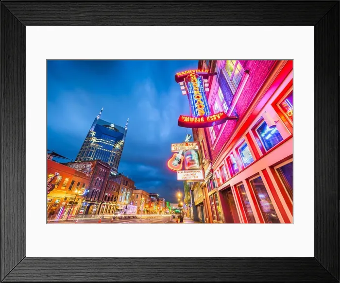 Framed Print : NASHVILLE, TENNESSEE - AUGUST 20, 2018: Honky-tonks on Lower Broadway. The district is famous for the numerous country music entertainment establishme Framed Print : NASHVILLE, TENNESSEE - AUGUST 20, 2018: Honky-tonks on Lower Broadway. The district is famous for the numerous country music entertainment establishme