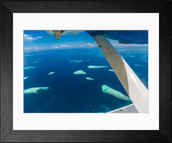 Framed Print : Beautiful aerial view of resort water bungalows in Maldives Framed Print : Beautiful aerial view of resort water bungalows in Maldives