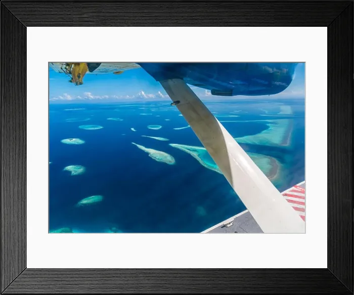 Framed Print : Beautiful aerial view of resort water bungalows in Maldives Framed Print : Beautiful aerial view of resort water bungalows in Maldives
