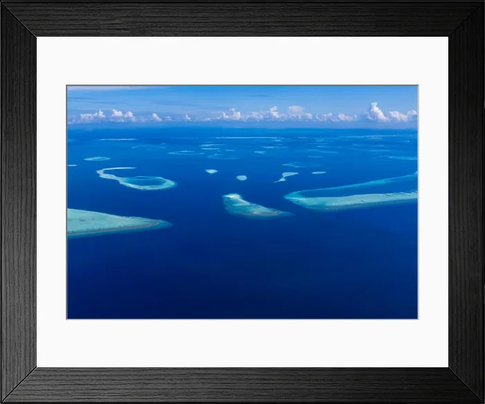 Framed Print : Beautiful aerial view of resort water bungalows in Maldives Framed Print : Beautiful aerial view of resort water bungalows in Maldives
