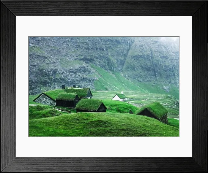 Framed Print : Summer view of traditional turf-top church Saksunar Kirkja in Saksun village. Beauty landscape with grassy houses and high mountains Framed Print : Summer view of traditional turf-top church Saksunar Kirkja in Saksun village. Beauty landscape with grassy houses and high mountains