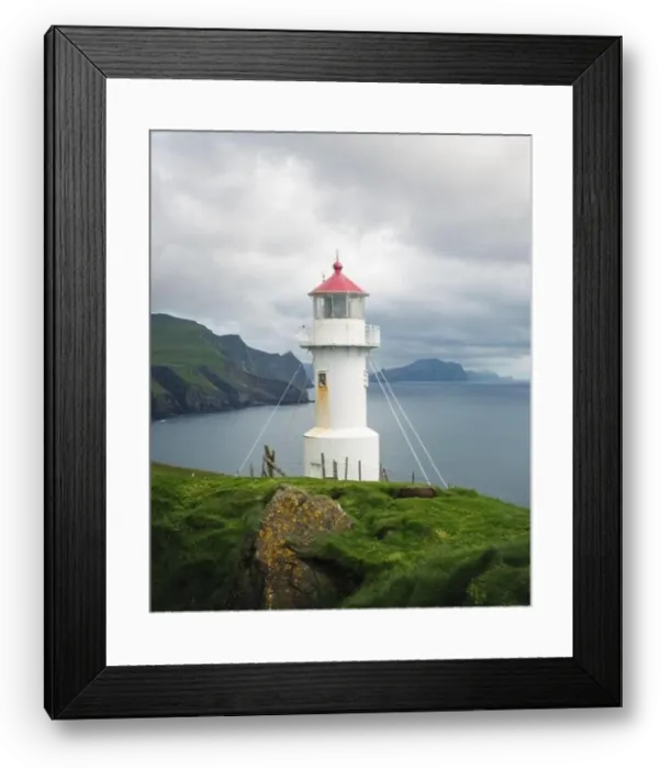 Framed Print : Foggy view of old lighthouse on the Mykines island, Faroe islands, Denmark. Landscape photography Framed Print : Foggy view of old lighthouse on the Mykines island, Faroe islands, Denmark. Landscape photography
