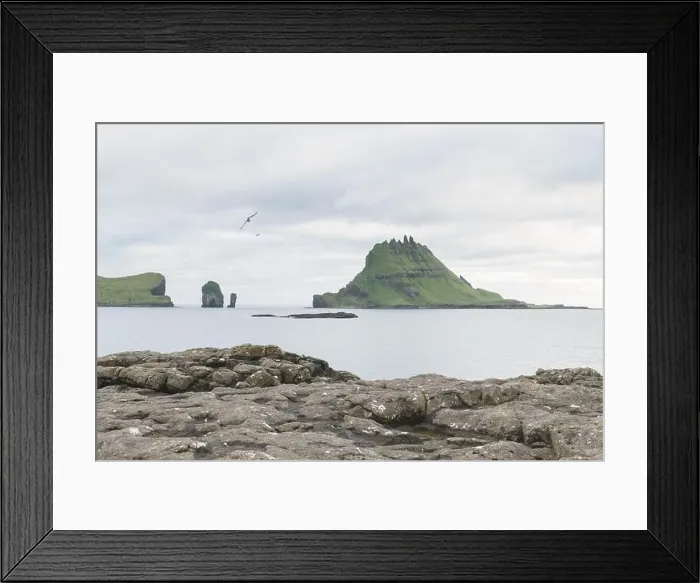 Framed Print : Dramatic view on Drangarnir and Tindholmur sea stacks in Atlantic ocean from Vagar island, Faroe Islands. Landscape photography Framed Print : Dramatic view on Drangarnir and Tindholmur sea stacks in Atlantic ocean from Vagar island, Faroe Islands. Landscape photography