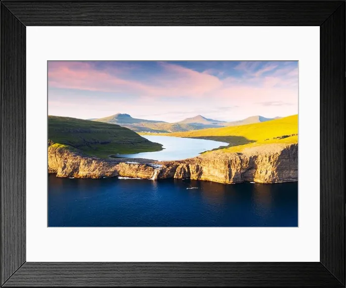 Framed Print : Aerial view from drone of Sorvagsvatn lake on cliffs of Vagar island in sunset time, Faroe Islands, Denmark. Landscape photography Framed Print : Aerial view from drone of Sorvagsvatn lake on cliffs of Vagar island in sunset time, Faroe Islands, Denmark. Landscape photography