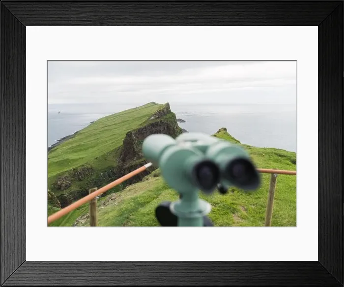 Framed Print : Foggy view of old lighthouse from viewpoint with tourist binoculars on the Mykines island, Faroe islands, Denmark. Landscape photography Framed Print : Foggy view of old lighthouse from viewpoint with tourist binoculars on the Mykines island, Faroe islands, Denmark. Landscape photography