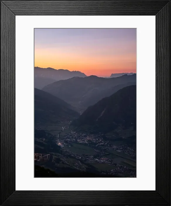 Framed Print : Scenic mountain landscape with orange sunset and idyllic valley village at summer evening in Austria alps Framed Print : Scenic mountain landscape with orange sunset and idyllic valley village at summer evening in Austria alps