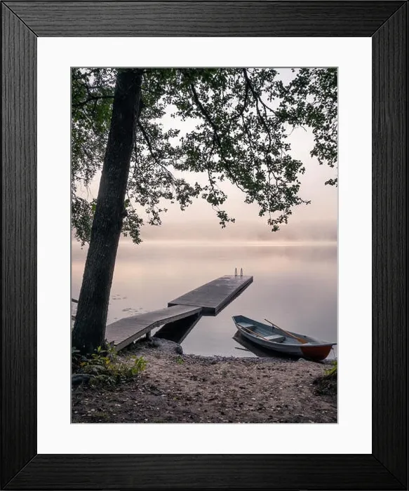 Framed Print : Scenic landscape view with tranquil lake, idyllic pier and boats at foggy summer morning in Finland Framed Print : Scenic landscape view with tranquil lake, idyllic pier and boats at foggy summer morning in Finland