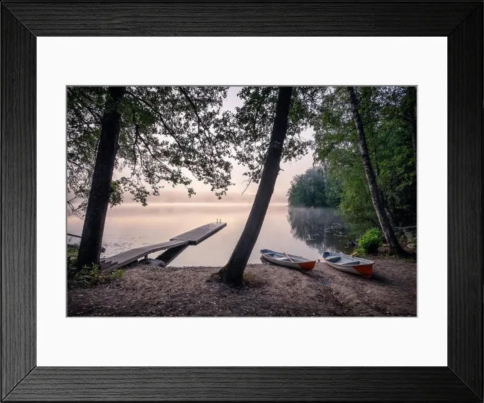 Framed Print : Scenic landscape view with tranquil lake, idyllic pier and boats at foggy summer morning in Finland Framed Print : Scenic landscape view with tranquil lake, idyllic pier and boats at foggy summer morning in Finland