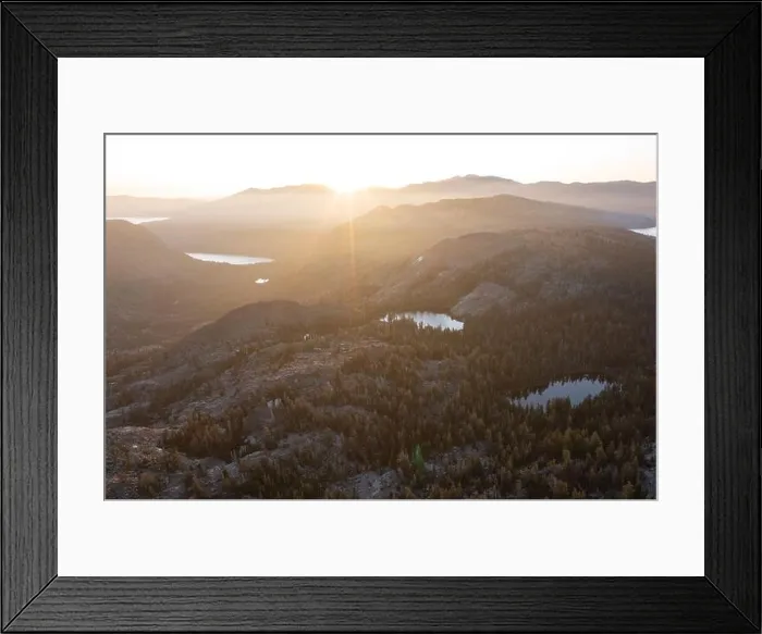 Framed Print : Sunrise illuminates the Desolation Wilderness, a federally protected wilderness area just west of Lake Tahoe, straddling the Sierra Nevada mountains Framed Print : Sunrise illuminates the Desolation Wilderness, a federally protected wilderness area just west of Lake Tahoe, straddling the Sierra Nevada mountains