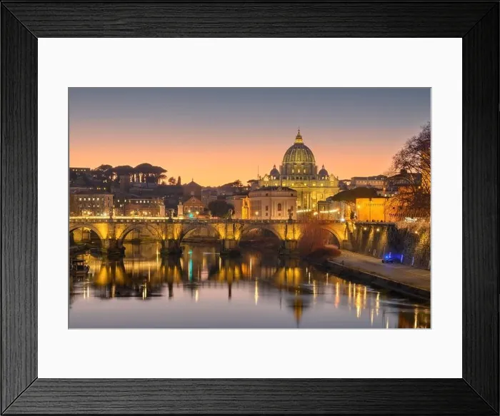 Framed Print : St. Peter's Basilica in Vatican City with the Tiber River passing through Rome, Italy at dusk Framed Print : St. Peter's Basilica in Vatican City with the Tiber River passing through Rome, Italy at dusk