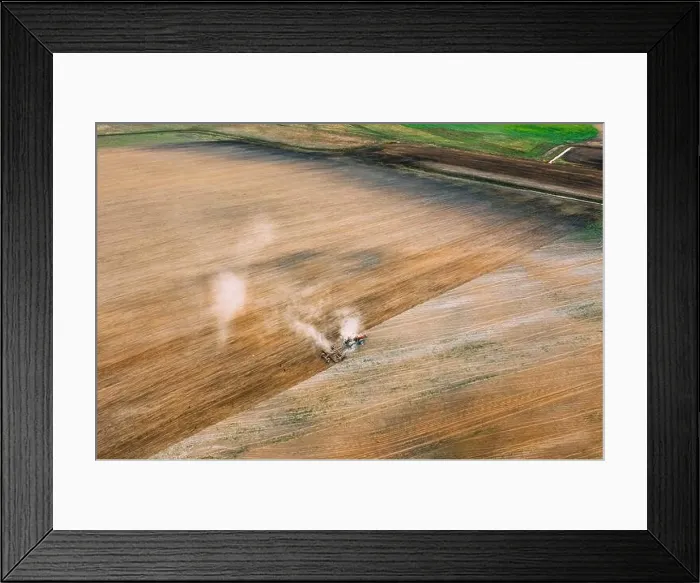Framed Print : Aerial View. Tractor Plowing Field In Spring Season. Beginning Of Agricultural Spring Season. Cultivator Pulled By A Tractor In Countryside Rural Fiel Framed Print : Aerial View. Tractor Plowing Field In Spring Season. Beginning Of Agricultural Spring Season. Cultivator Pulled By A Tractor In Countryside Rural Fiel