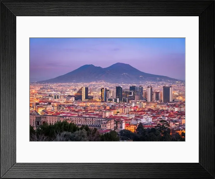Framed Print : Naples, Italy with the financial district skyline under Mt. Vesuvius at twilight Framed Print : Naples, Italy with the financial district skyline under Mt. Vesuvius at twilight