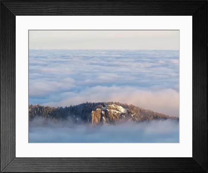 Framed Print : Aerial view of distant mountain peaks above clouds in clear sunny blue sky Framed Print : Aerial view of distant mountain peaks above clouds in clear sunny blue sky