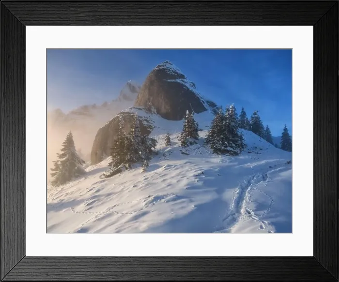 Framed Print : Beautiful mountain peaks in snow in winter at sunset. Colorful landscape with high snowy rocks in morning fog, blue sky with worm sunrise light Framed Print : Beautiful mountain peaks in snow in winter at sunset. Colorful landscape with high snowy rocks in morning fog, blue sky with worm sunrise light