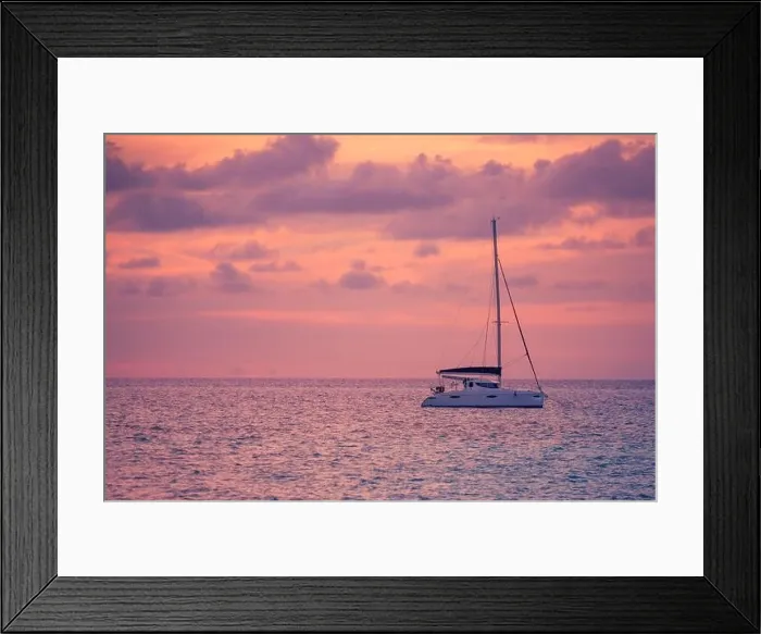 Framed Print : Sunset views at the sea with a yacht or silhouette of catamaran. Luxury travel and tourism vacation. Summer recreational background, seascape Framed Print : Sunset views at the sea with a yacht or silhouette of catamaran. Luxury travel and tourism vacation. Summer recreational background, seascape