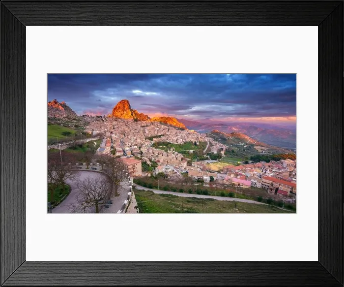 Framed Print : Caltabellotta, Sicily, Italy. Cityscape image if historic town Caltabellotta in Sicily at dramatic sunset Framed Print : Caltabellotta, Sicily, Italy. Cityscape image if historic town Caltabellotta in Sicily at dramatic sunset