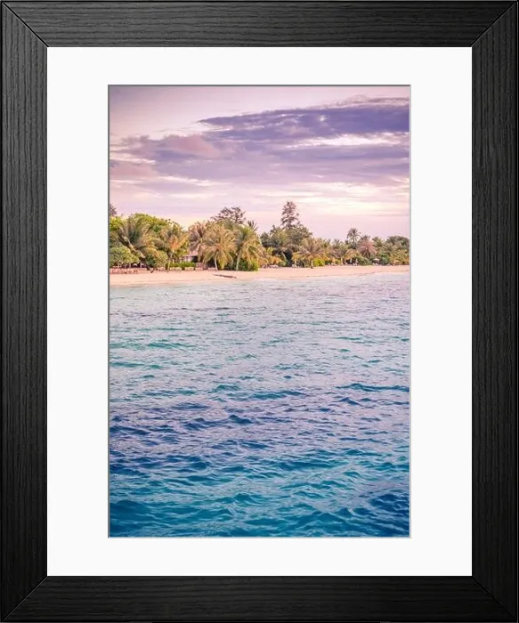 Framed Print : Sunset beach coastline with palm trees and calm sea under colorful sky. Vertical beach landscape Framed Print : Sunset beach coastline with palm trees and calm sea under colorful sky. Vertical beach landscape