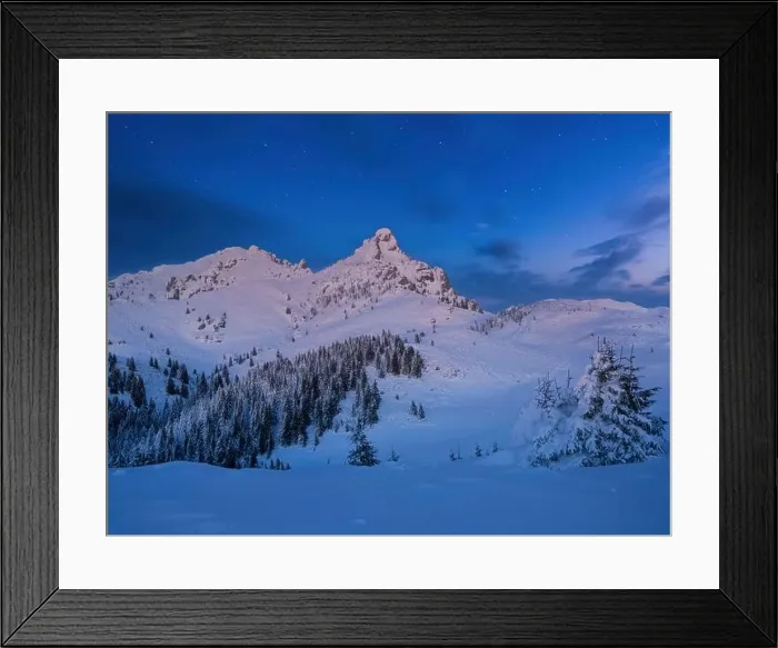 Framed Print : Beautiful night winter landscape in the mountains. Vibrant night sky with stars and clouds Framed Print : Beautiful night winter landscape in the mountains. Vibrant night sky with stars and clouds