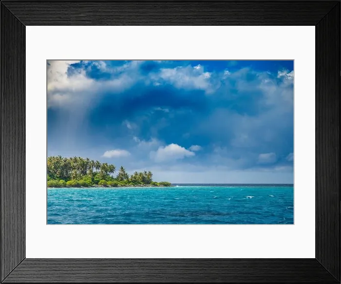 Framed Print : Overcast tropical beach with white sand, palm trees, turquoise ocean against cloudy sky with waves on sunny summer day. Perfect landscape background Framed Print : Overcast tropical beach with white sand, palm trees, turquoise ocean against cloudy sky with waves on sunny summer day. Perfect landscape background