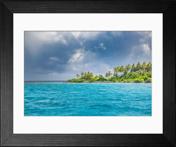 Framed Print : Overcast tropical beach with white sand, palm trees, turquoise ocean against cloudy sky with waves on sunny summer day. Perfect landscape background Framed Print : Overcast tropical beach with white sand, palm trees, turquoise ocean against cloudy sky with waves on sunny summer day. Perfect landscape background