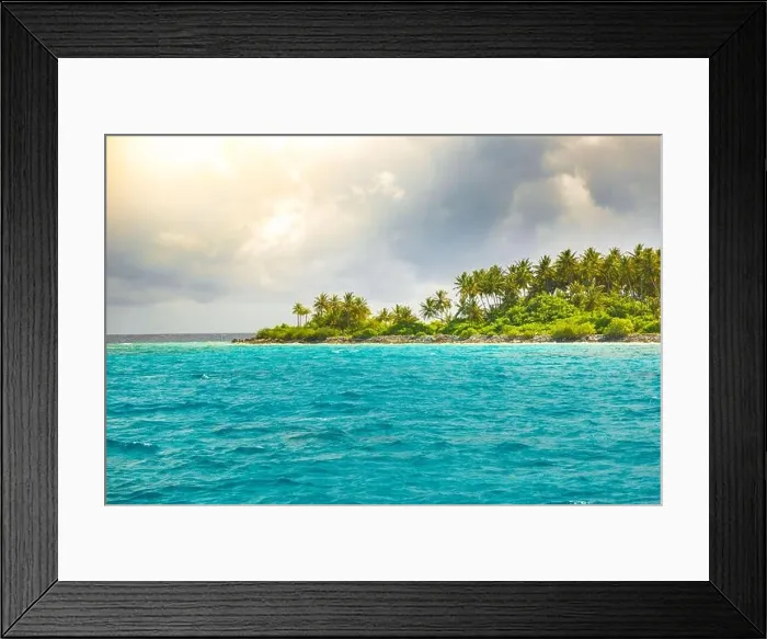 Framed Print : Overcast tropical beach with white sand, palm trees, turquoise ocean against cloudy sky with waves on sunny summer day. Perfect landscape background Framed Print : Overcast tropical beach with white sand, palm trees, turquoise ocean against cloudy sky with waves on sunny summer day. Perfect landscape background
