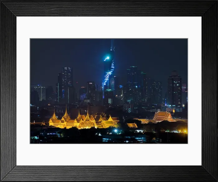 Framed Print : Grand palace bangkok with bangkok city skyscrapers at night in Bangkok, Thailand Framed Print : Grand palace bangkok with bangkok city skyscrapers at night in Bangkok, Thailand