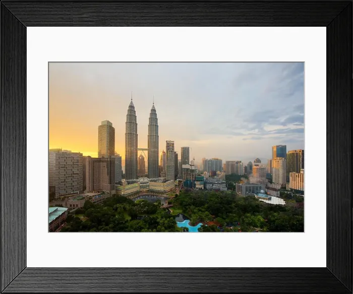 Framed Print : Kuala lumpur city skyline at sunset in Kuala lumpur, Malaysia. Kuala lumpur skyscraper building in Malaysia Framed Print : Kuala lumpur city skyline at sunset in Kuala lumpur, Malaysia. Kuala lumpur skyscraper building in Malaysia