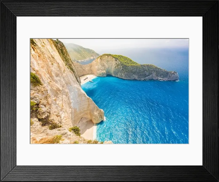 Framed Print : Navagio bay and Ship Wreck beach in summer. The most famous natural landmark of Zakynthos, Greek island in the Ionian Sea Framed Print : Navagio bay and Ship Wreck beach in summer. The most famous natural landmark of Zakynthos, Greek island in the Ionian Sea