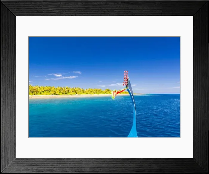 Framed Print : View from the deck of the traditional Maldivian wooden fishing boats on landscape of tropical island with a sandy beach and palm trees Framed Print : View from the deck of the traditional Maldivian wooden fishing boats on landscape of tropical island with a sandy beach and palm trees