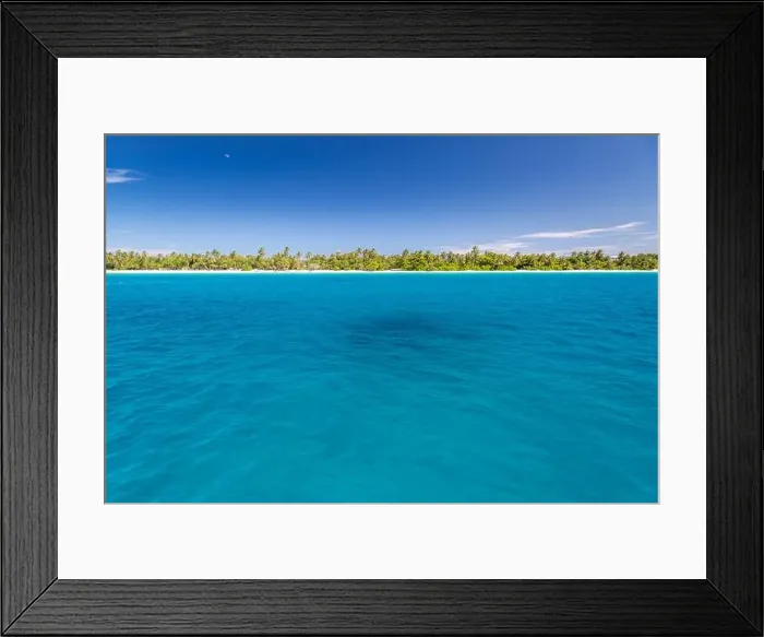 Framed Print : Amazing tropical seascape, aerial sea view with island and beach. Palm trees on white sandy beach Framed Print : Amazing tropical seascape, aerial sea view with island and beach. Palm trees on white sandy beach