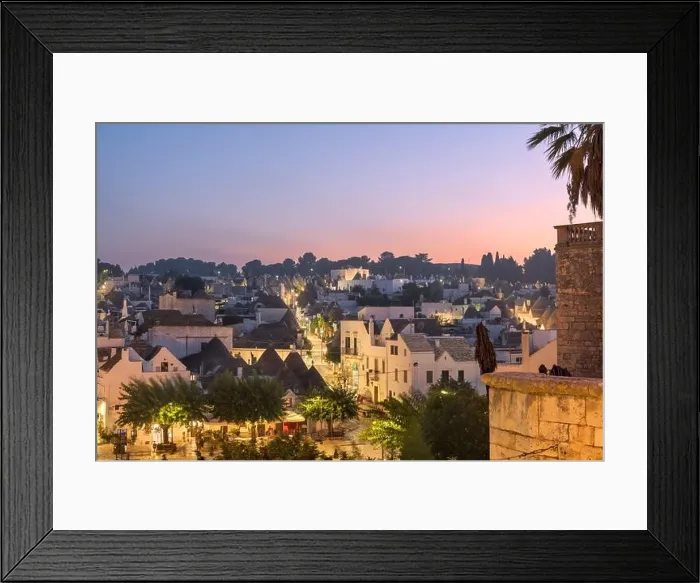 Framed Print : Alberobello, Italy with Trulli houses at dusk Framed Print : Alberobello, Italy with Trulli houses at dusk