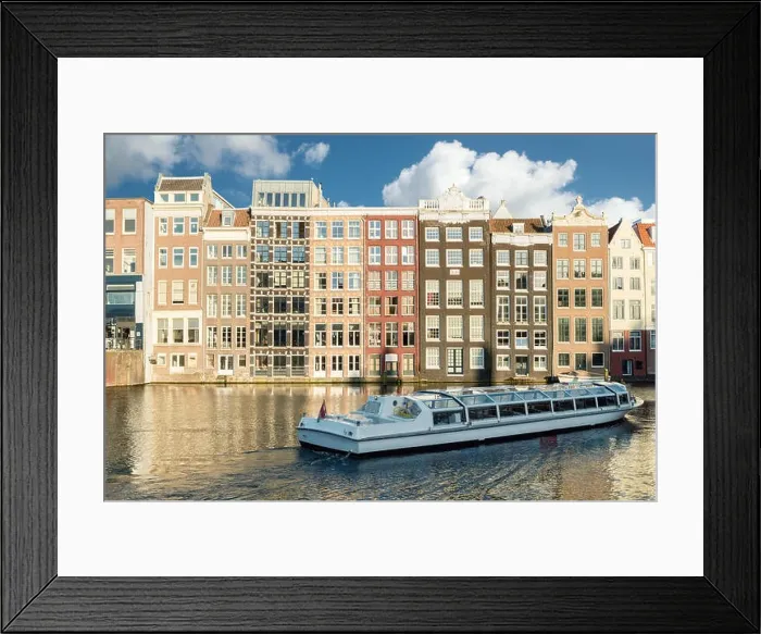 Framed Print : Amsterdam canal cruise ship with Netherlands traditional house in Amsterdam, Netherlands Framed Print : Amsterdam canal cruise ship with Netherlands traditional house in Amsterdam, Netherlands