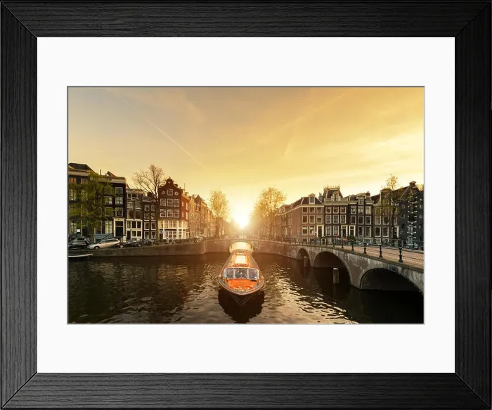 Framed Print : Amsterdam canal cruise ship with Netherlands traditional house in Amsterdam, Netherlands Framed Print : Amsterdam canal cruise ship with Netherlands traditional house in Amsterdam, Netherlands