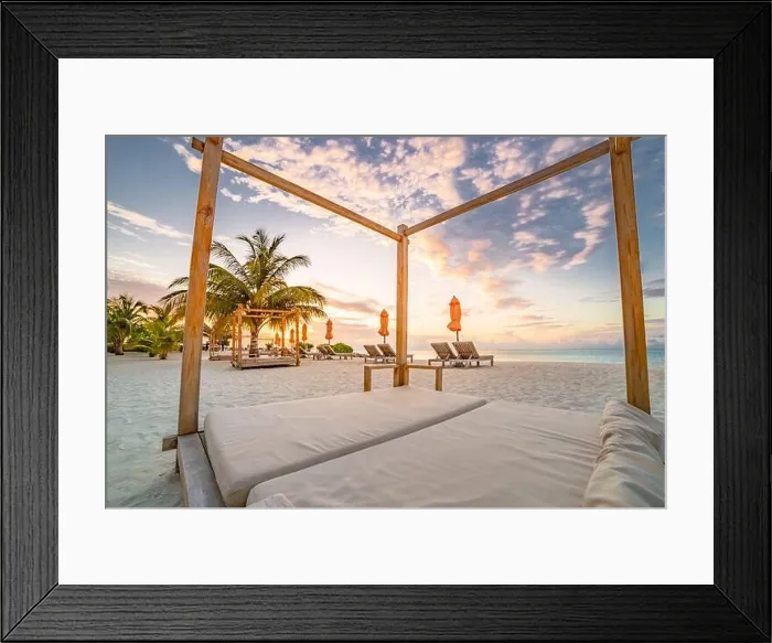Framed Print : Summer beach landscape. Luxury vacation and holiday concept, summer travel banner. Panoramic landscape of sunset beach, two loungers umbrella, palms Framed Print : Summer beach landscape. Luxury vacation and holiday concept, summer travel banner. Panoramic landscape of sunset beach, two loungers umbrella, palms