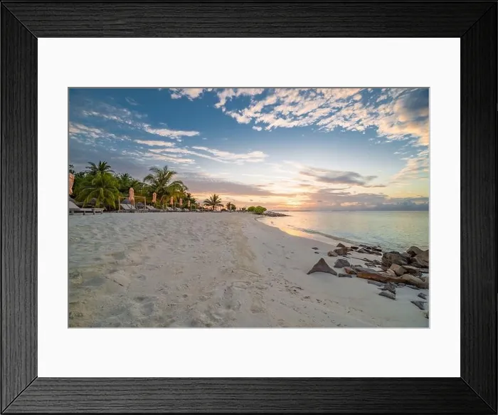 Framed Print : Summer beach landscape. Luxury vacation and holiday concept, summer travel banner. Panoramic landscape of sunset beach, two loungers umbrella, palms Framed Print : Summer beach landscape. Luxury vacation and holiday concept, summer travel banner. Panoramic landscape of sunset beach, two loungers umbrella, palms