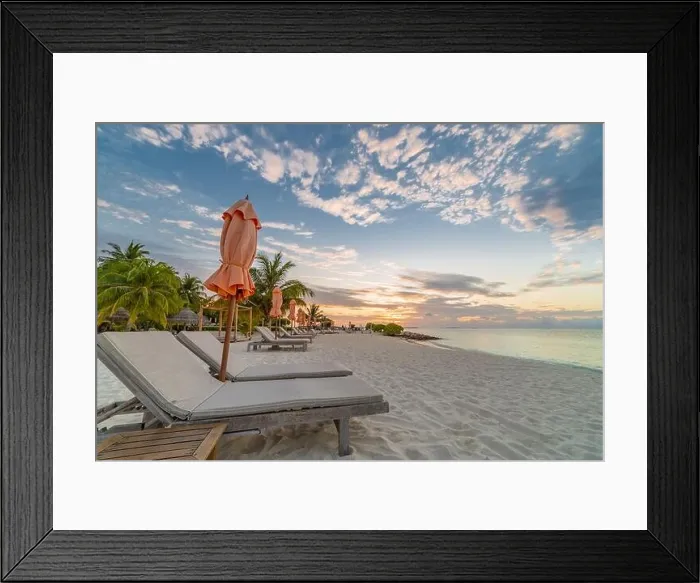 Framed Print : Summer beach landscape. Luxury vacation and holiday concept, summer travel banner. Panoramic landscape of sunset beach, two loungers umbrella, palms Framed Print : Summer beach landscape. Luxury vacation and holiday concept, summer travel banner. Panoramic landscape of sunset beach, two loungers umbrella, palms
