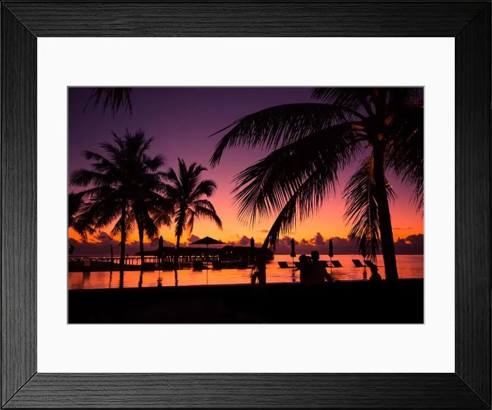 Framed Print : Tropical beach background with palm trees silhouette at sunset. Vintage effect Framed Print : Tropical beach background with palm trees silhouette at sunset. Vintage effect