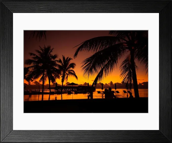 Framed Print : Tropical beach background with palm trees silhouette at sunset. Vintage effect Framed Print : Tropical beach background with palm trees silhouette at sunset. Vintage effect