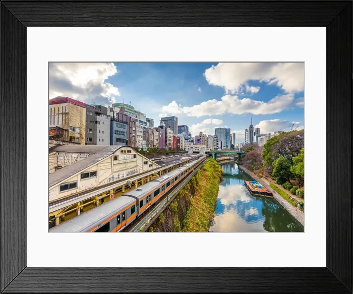 Framed Print : Trains pass by the Kanda River in the Ochanomizu district of Tokyo, Japan Framed Print : Trains pass by the Kanda River in the Ochanomizu district of Tokyo, Japan
