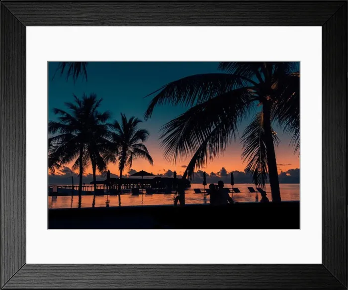 Framed Print : Tropical beach background with palm trees silhouette at sunset. Vintage effect Framed Print : Tropical beach background with palm trees silhouette at sunset. Vintage effect