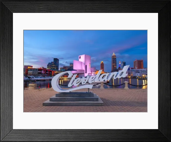 Framed Print : AUGUST 10, 2019 - CLEVELAND, OHIO: The landmark skyline of downtown Cleveland from Voinovich Bicentennial Park in the early morning Framed Print : AUGUST 10, 2019 - CLEVELAND, OHIO: The landmark skyline of downtown Cleveland from Voinovich Bicentennial Park in the early morning
