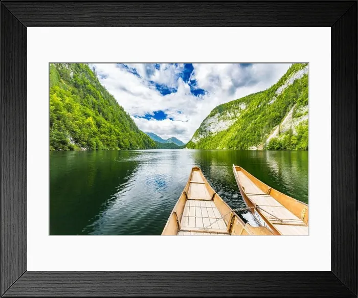 Framed Print : A dramatic sunset from an old canoe on a clam mountain lake in Framed Print : A dramatic sunset from an old canoe on a clam mountain lake in