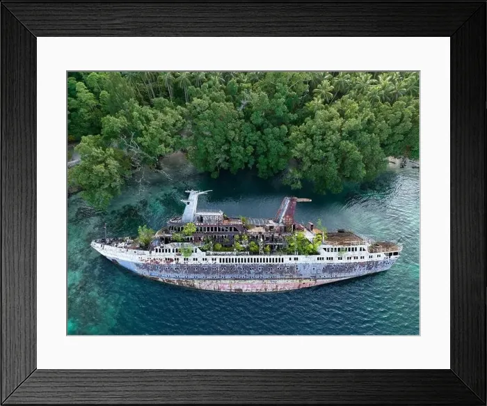 Framed Print : Mother Nature is slowly reclaiming the World Discoverer, a cruise ship that was shipwrecked in the Solomon Islands. The ship struck a reef in 2000 Framed Print : Mother Nature is slowly reclaiming the World Discoverer, a cruise ship that was shipwrecked in the Solomon Islands. The ship struck a reef in 2000