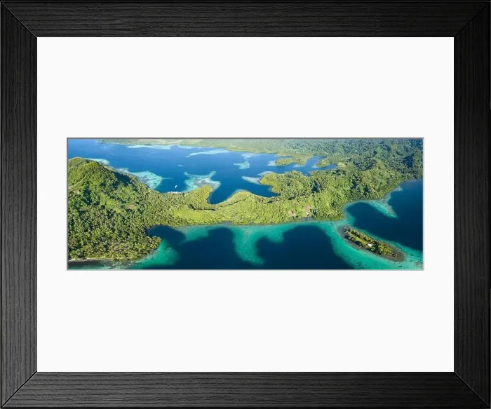 Framed Print : Coral reefs fringe convoluted, tropical islands found in a remote part of the Solomon Islands. This country harbors extraordinary marine biodiversity Framed Print : Coral reefs fringe convoluted, tropical islands found in a remote part of the Solomon Islands. This country harbors extraordinary marine biodiversity