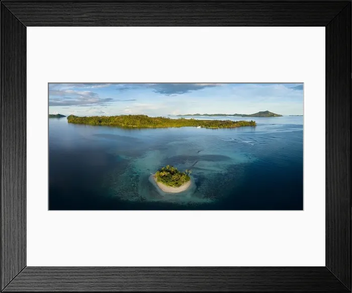 Framed Print : A beautiful coral reef surrounds a scenic island in the Solomon Islands. This beautiful country is home to spectacular marine biodiversity Framed Print : A beautiful coral reef surrounds a scenic island in the Solomon Islands. This beautiful country is home to spectacular marine biodiversity